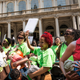 Women breastfeed their children outside City Hall during a ralley to support breastfeeding in public on August 8, 2014 in New York City. Image via Getty.